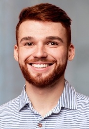 Smiling young man wearing striped shirt