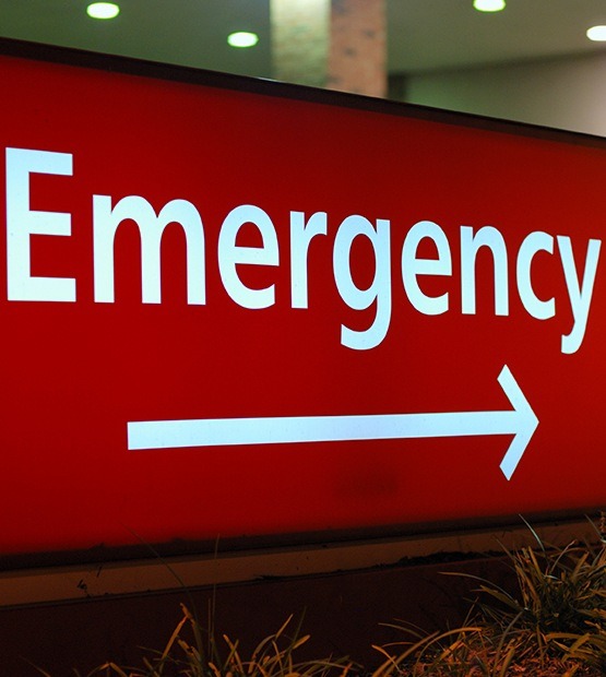 Emergency sign by hospital building