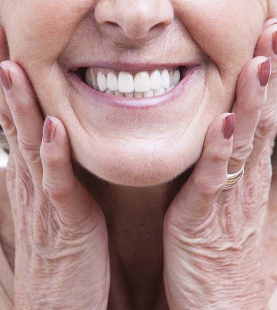 Closeup of smiling woman with dental implants in Flower Mound