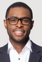Young man in glasses and business attire