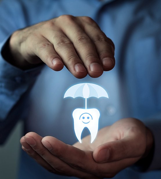 Hnad holding animated tooth under an umbrella