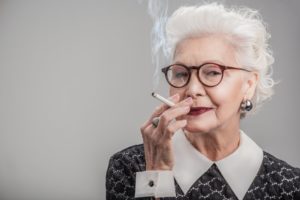 mature woman smoking a cigarette