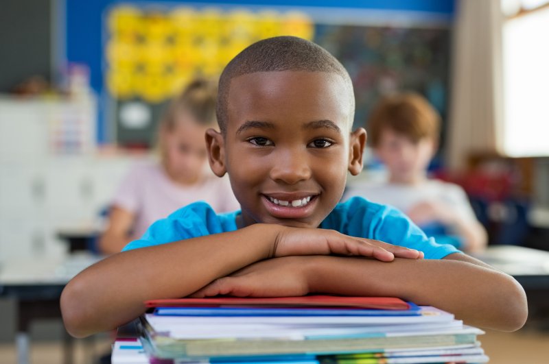closeup of child smiling in school